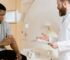 Non-surgical kidney stone dissolution under medical supervision